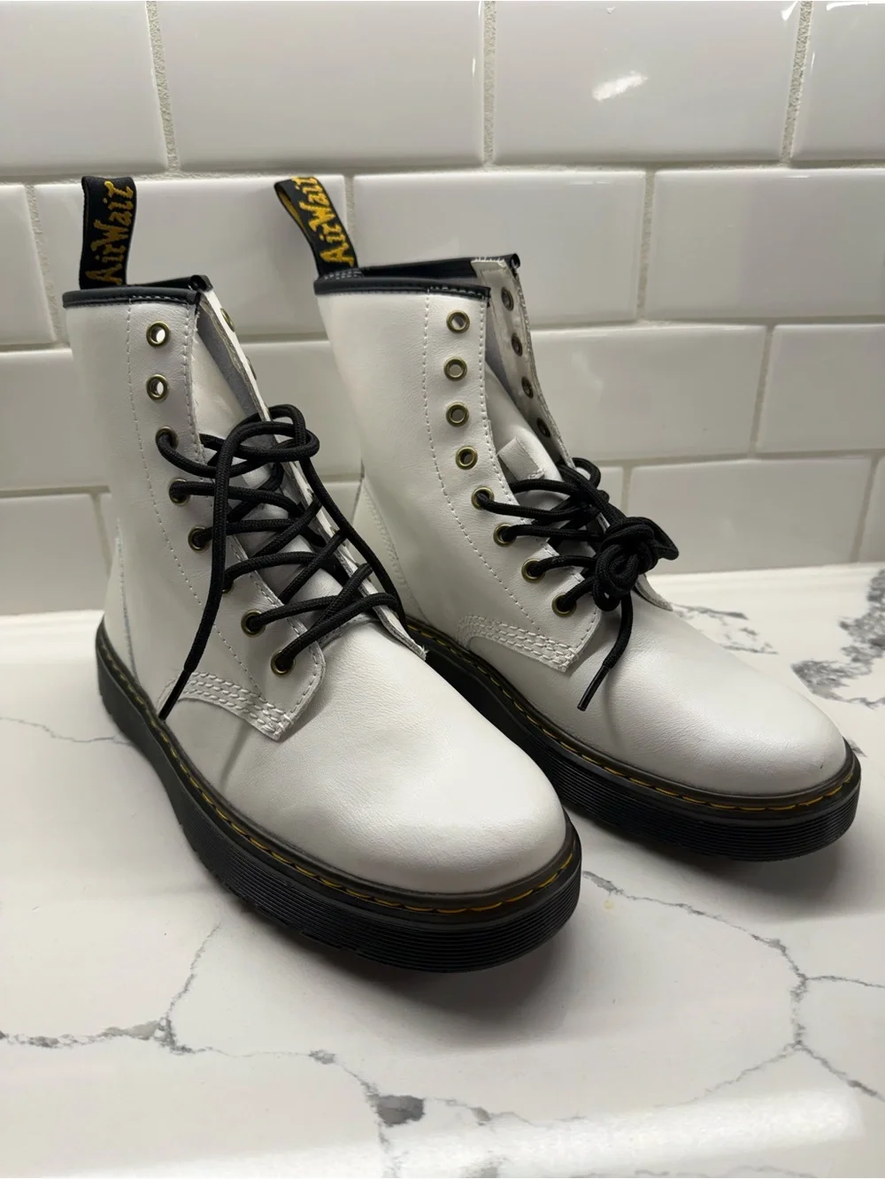 Dr. Martens White Leather Lace-Up Platform Boots with Black Sole
